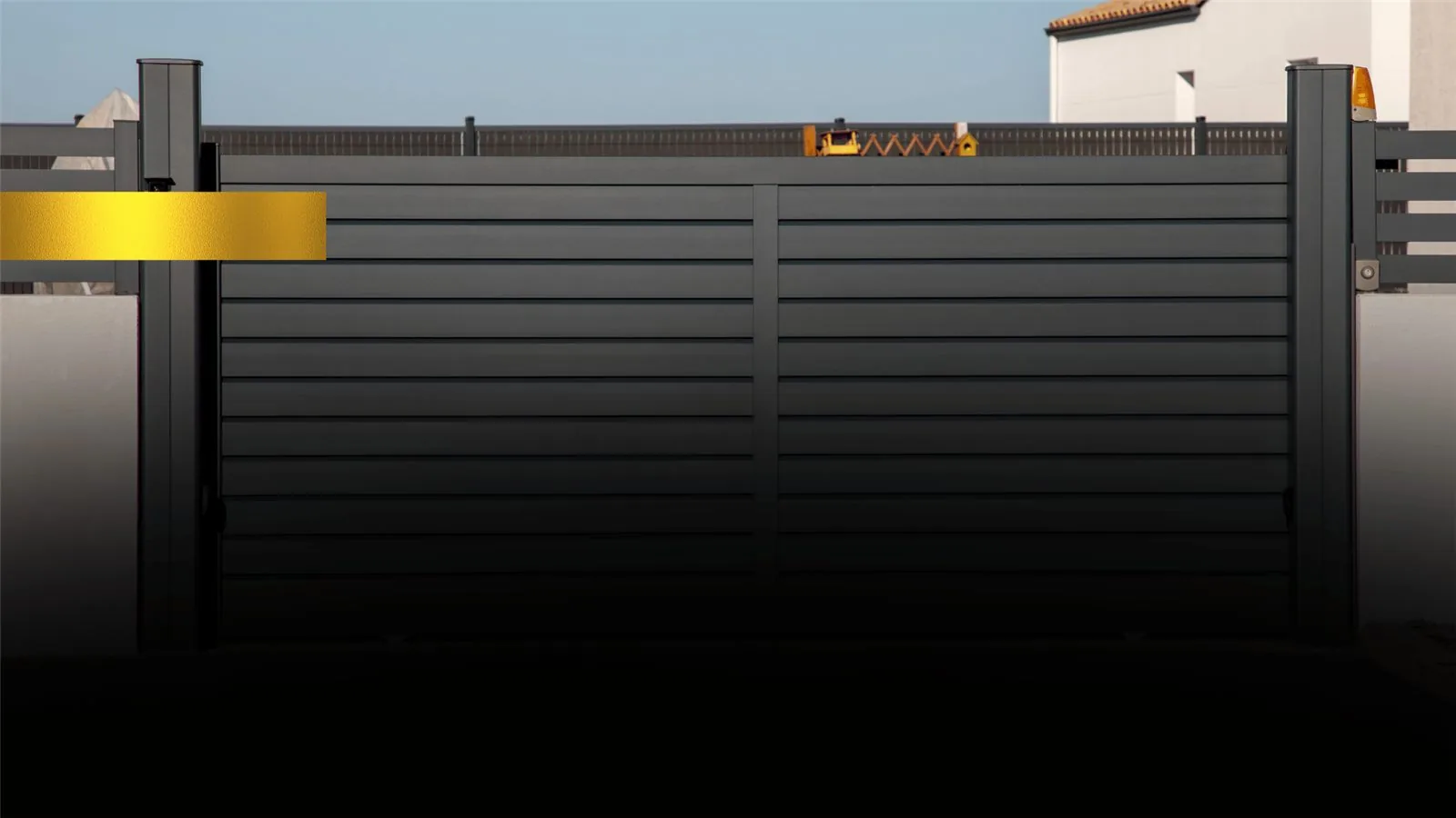 Automated gate at night